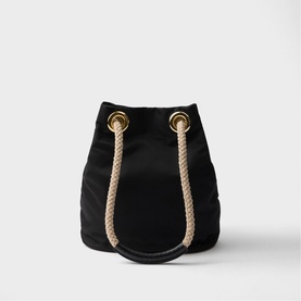 Prada Accessories black bucket bag with gold-tone eyelets and natural rope drawstring handles, structured base