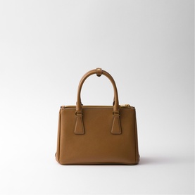 Prada Galleria small caramel Saffiano leather tote bag with gold-tone hardware and structured double top handles