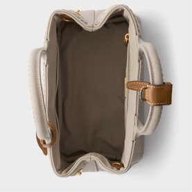 Prada Accessories neutral bag, top-down view showing taupe interior, gold-tone hardware and tan leather strap detail