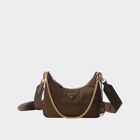 Prada Re-Edition 2005 chocolate brown nylon shoulder bag with gold chain strap, triangle logo, and detachable pouch