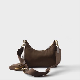 Dark brown nylon shoulder bag with gold-tone hardware, detachable wide crossbody strap, zip closure, and small coin pouch attachment