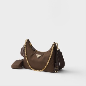 Prada brown nylon re-edition shoulder bag with gold chain strap, triangle logo plaque, and detachable mini coin pouch