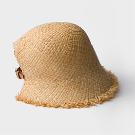 Prada Accessories neutral raffia bucket hat with frayed brim and small leather buckle detail, side view