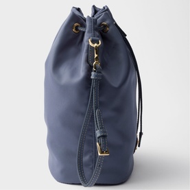 Prada Accessories blue nylon drawstring bucket bag with gold-tone hardware, wrist strap, and adjustable toggle closure