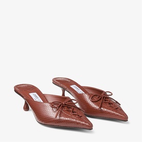 Jimmy Choo red croc-embossed leather pointed-toe mules with bow detail and kitten heel, pair shown together