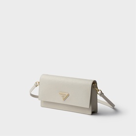 Prada Accessories neutral leather crossbody bag with gold triangle logo hardware and adjustable shoulder strap.
