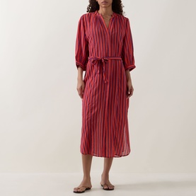 Model wearing Sea Level Vacay Boho Striped Shirt Dress in Spice Red, midi length with balloon sleeves and tie belt, styled with flat sandals.