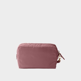 Dusty pink nylon cosmetics pouch with zip closure, gold-tone hardware, and small charm detail