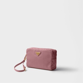 Prada dusty pink nylon cosmetic pouch with gold-tone triangle logo plaque and wrist strap