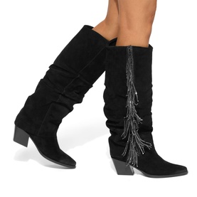 Model wearing KG by Kurt Geiger black suede knee-high western boots with crystal chain fringe detail and block heel
