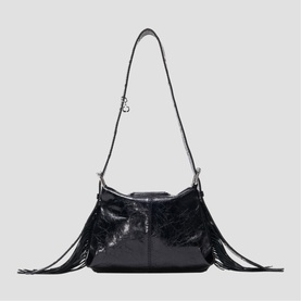 Maje black patent leather shoulder bag with fringe trim detail and adjustable crossbody strap, silver-tone hardware