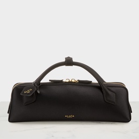 Le Teckel Clutch Bag