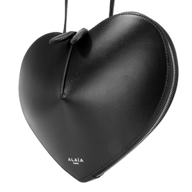 Alaia Le Coeur Crossbody Bag in Noir, heart-shaped black calf leather with silver-tone hardware, two-way zip and logo lettering