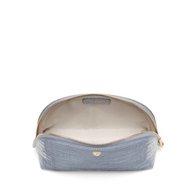 Aspinal of London Sky Blue croc-embossed cosmetic case, open to show cream interior lining, gold-tone zip and logo charm.