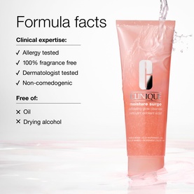 Clinique Moisture Surge Cleansing Scrub in pink tube, shown with formula facts: allergy tested, fragrance free, dermatologist tested, non-comedogenic