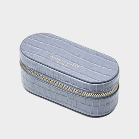 Aspinal of London Sky Blue croc-effect oval jewellery case with gold-tone zip and embossed logo lettering