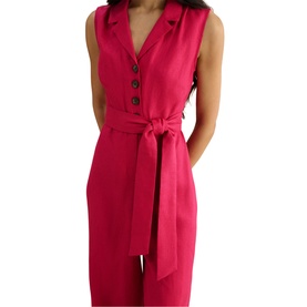 Model wearing Hobbs cherry pink sleeveless jumpsuit with V-neck, button front detail and self-tie waist belt