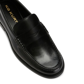 KG by Kurt Geiger black leather penny loafer, top-down view showing moc toe stitching and slip-on vamp detail