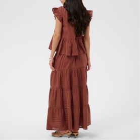 Model wearing Kaffe henna tiered maxi dress with flutter sleeves, ruffle detailing and V-neckline, back view