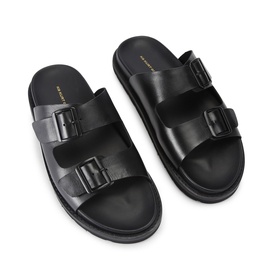 KG by Kurt Geiger black leather double-strap slides with buckle detail and chunky flatform sole, overhead view