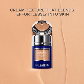 La Prairie Skin Caviar Concealer Foundation SPF 30 in Soft Pearl, navy blue bottle with open lid showing warm beige cream texture