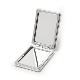 Aspinal of London compact mirror in silver-tone metal, open to reveal dual mirrors with polished rectangular frames