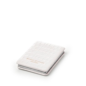 Aspinal of London Chalk White croc-embossed compact mirror with gold logo lettering, closed flat view.