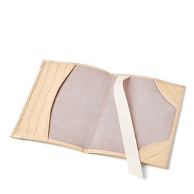 Aspinal of London buttermilk croc-embossed passport cover, open showing cream grosgrain ribbon and pale pink suede interior