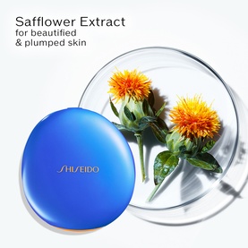 Shiseido UV Protective Compact Foundation SPF30 Refill, blue compact case, shown with safflower extract blooms highlighting skin-plumping ingredient