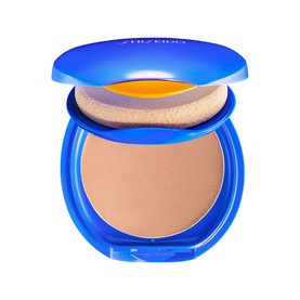 Shiseido UV Protective Compact Foundation SPF30 in blue compact case, open to reveal tan powder and applicator sponge