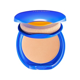 Shiseido UV Protective Compact Foundation SPF30 in blue compact case with powder puff, open lid showing warm beige shade