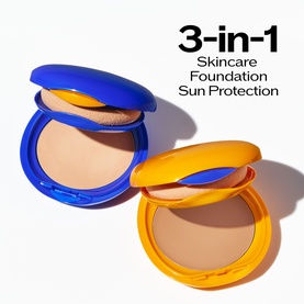 Shiseido UV Protective Compact Foundation SPF30 in blue and yellow compact cases, open to show pressed powder, labelled 3-in-1 Skincare Foundation