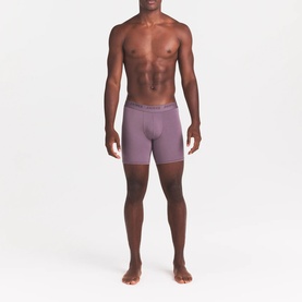 Model wearing Skims Boxers 3Pk in Iris Heather Multi, showing mid-length fit with elasticated branded waistband