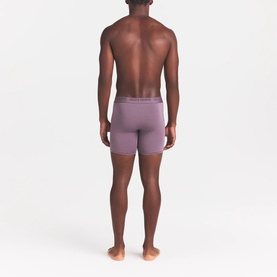 Model wearing Skims Boxers 3Pk in Iris Heather Multi, rear view showing fitted silhouette with branded waistband.