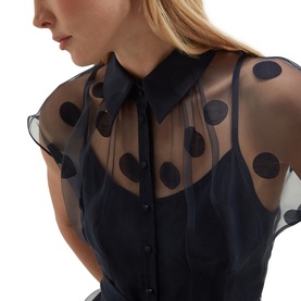 Model wearing Hobbs midnight navy sheer organza polka dot dress with contrast collar and button-front detail