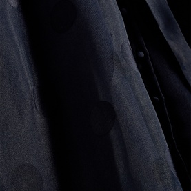 Hobbs midnight navy dress fabric close-up showing tonal spot jacquard pattern and button detail on sheer woven textile