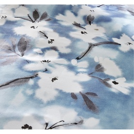 Vantona Osaka Duvet Set in multi, close-up of soft blue floral print fabric with white blossom and grey leaf details