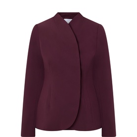 Burgundy collarless blazer with curved front opening, long sleeves, and tailored fit