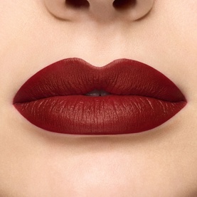 MAC MACximal Silky Matte Lipstick in UnNatural Redhead, shown on lips as a deep red matte finish
