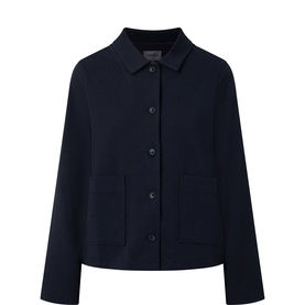 Oska navy jacket with point collar, button-front fastening, and two patch pockets, in a relaxed boxy fit