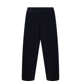 Oska navy wide-leg trousers with elasticated waistband, relaxed cropped fit, in polyester-cotton blend fabric.