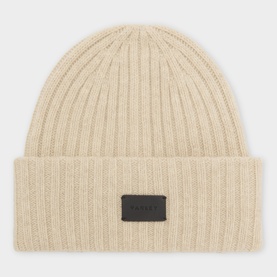Varley Rainy Day ribbed-knit beanie hat with folded cuff and dark logo patch, in cream merino wool blend