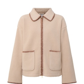 Varley Light Taupe fleece sweat top with contrast brown whipstitch trim, zip front, and two patch pockets