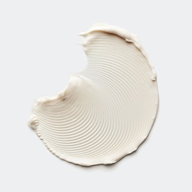 Clinique day cream texture swatch showing a creamy white swirl with ridged detail on a light grey background
