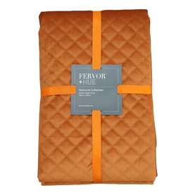 Fervor + Hue Velvet Quilted Throw in Copper, folded and tied with ribbon, showing diamond-quilted texture