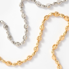 Mint Velvet Beaded Necklace in gold and silver tones, short style with rounded beaded links, shown in both colourways