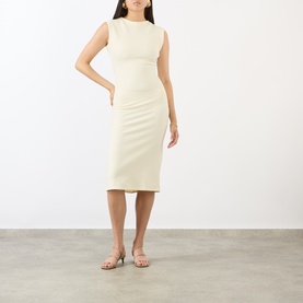 Model wearing Jacquemus off-white sleeveless ribbed midi dress, styled with nude flat sandals.