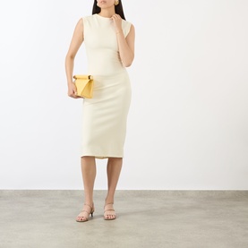 Model wearing Jacquemus off-white sleeveless ribbed midi dress, styled with a yellow clutch bag and nude strappy sandals.
