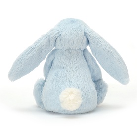 Jellycat blue plush bunny rattle, rear view showing fluffy white cotton tail and soft long ears, small seated soft toy