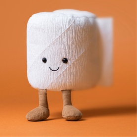 Jellycat Amuseables white toilet roll plush soft toy with smiling face and small beige legs, on orange background